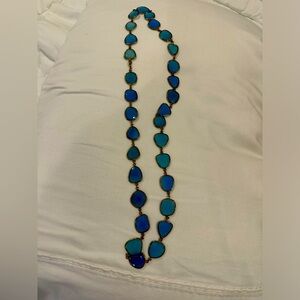 Jennifer Miller long blue stone necklace.